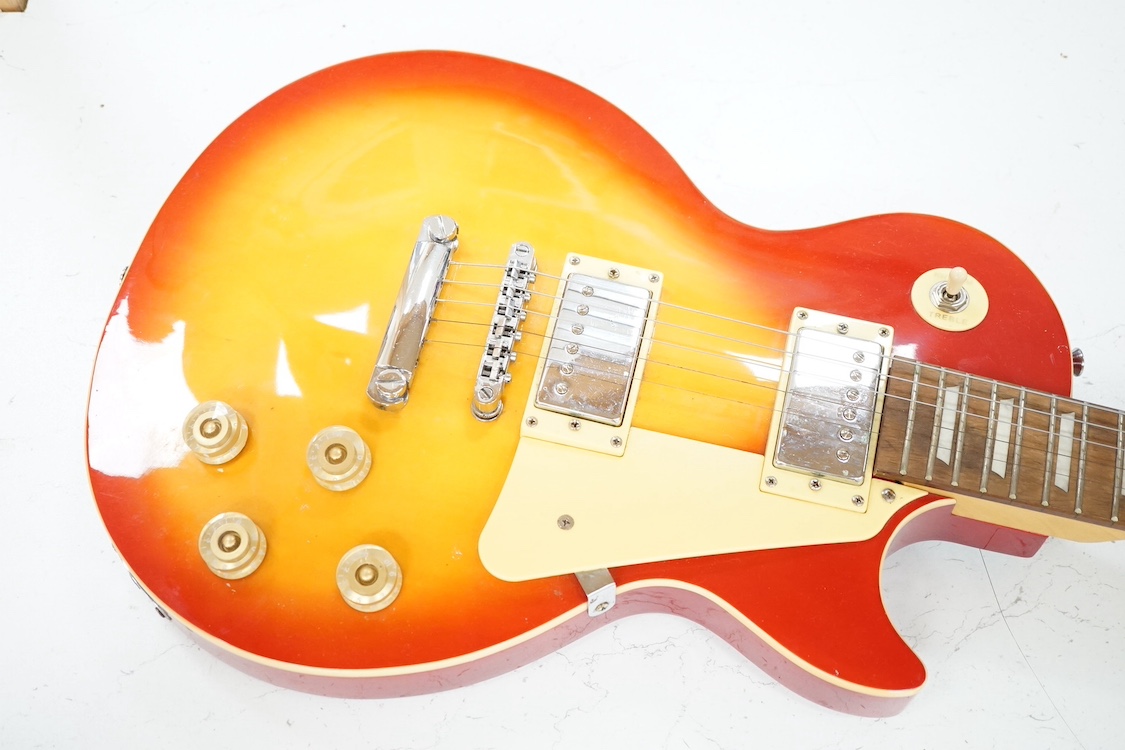 A Les Paul style guitar, 100cm high. Condition - good